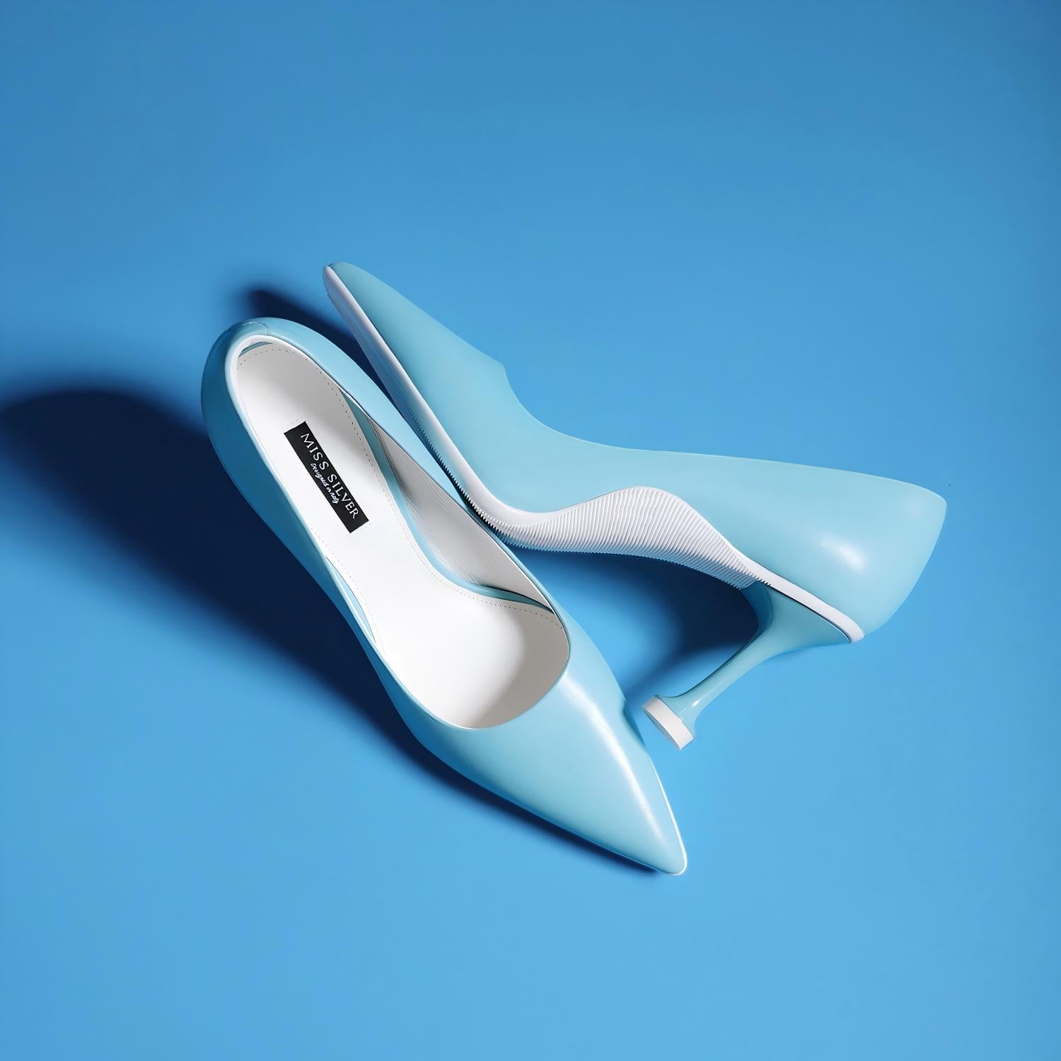 Light Blue Leather Pointed Toe Pumps with Fluted