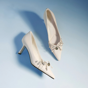 White Leather Crystal Bow Pointed Toe Bridal Pumps